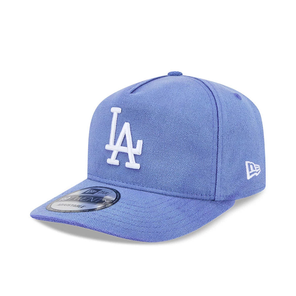 LA Dodgers MLB Duck Canvas Pastel Blue New Era 19TWENTY Adjustable Cap, three-quarter view showing the white embroidered LA logo on the front panel, a matching pastel blue rigid visor with a 19TWENTY size sticker.