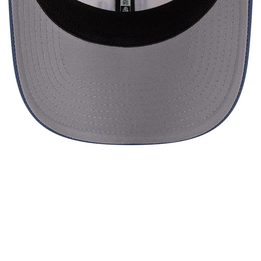 Dodgers MLB Slate Stone Cream & Dark Blue New Era 9SEVENTY Stretch Snap Adjustable Cap, inside view showing the dark undervisor, black sweatband and white taping with a New Era logo, highlighting the cap’s detailed internal construction.