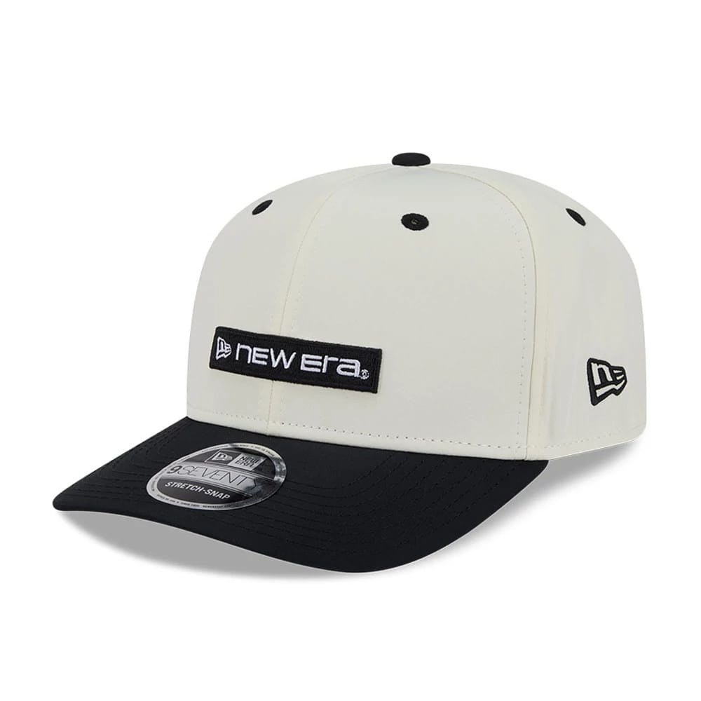 Pictured is this New Era Linear Logo 9SEVENTY Stretch Snap cap in white. 1