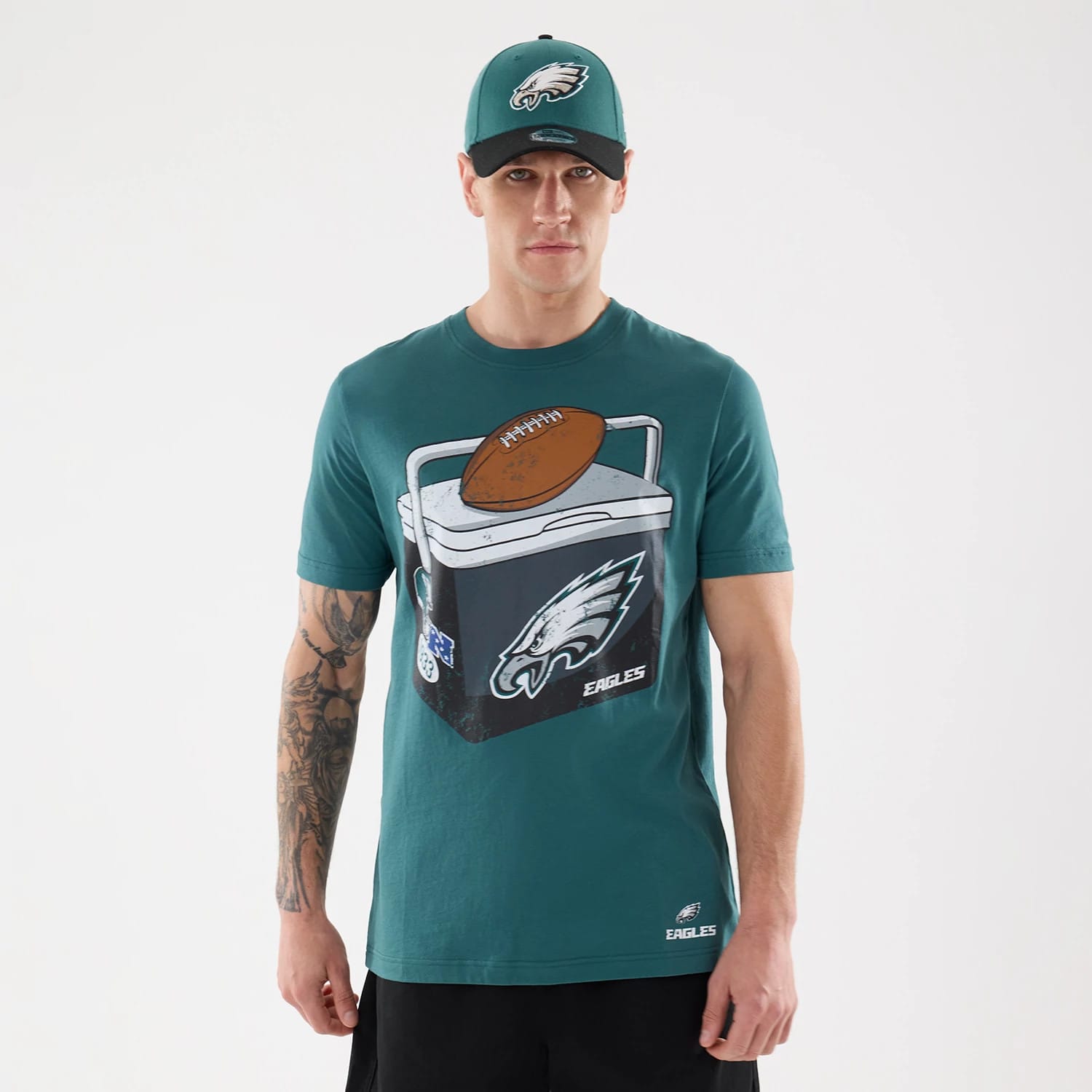 The model is wearing this NFL Training 2026 Philadelphia Eagles T-Shirt in dark green. 1