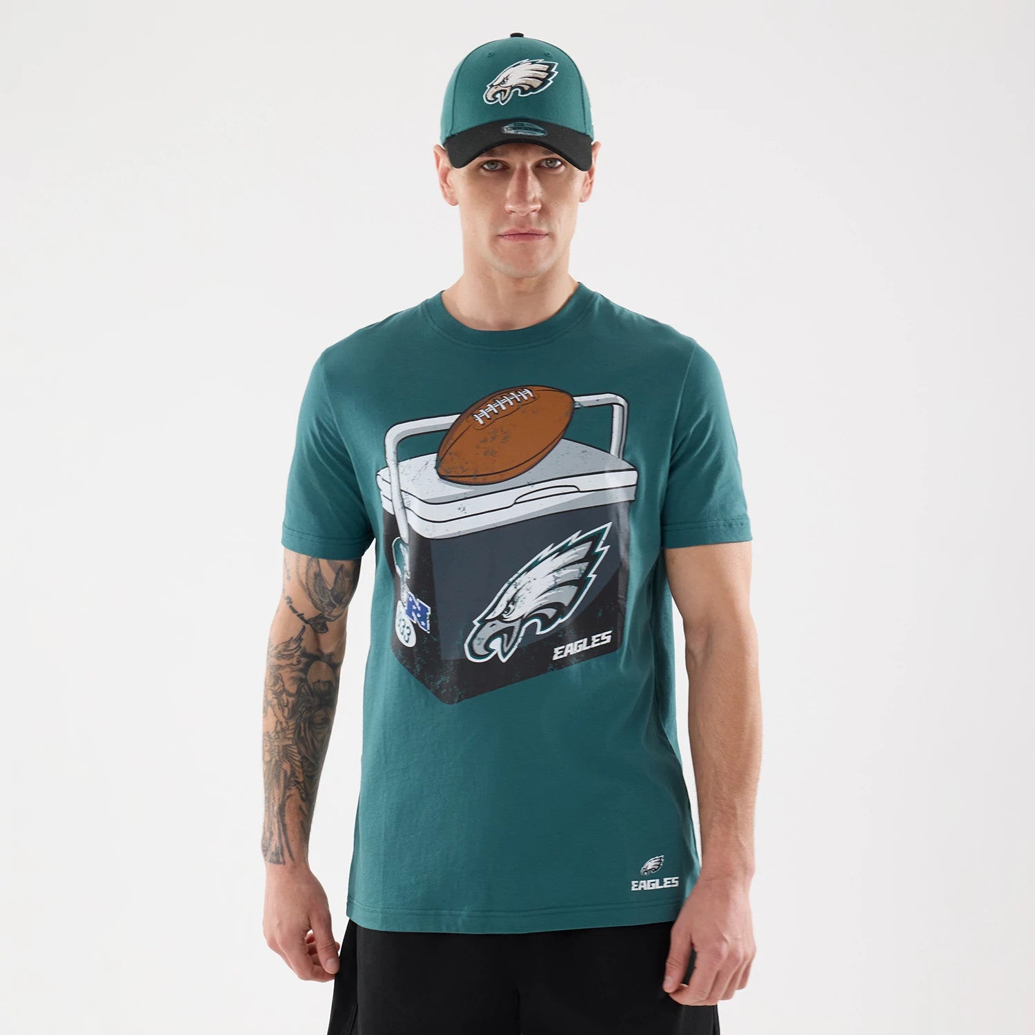 The model is wearing this NFL Training 2026 Philadelphia Eagles T-Shirt in dark green. 1