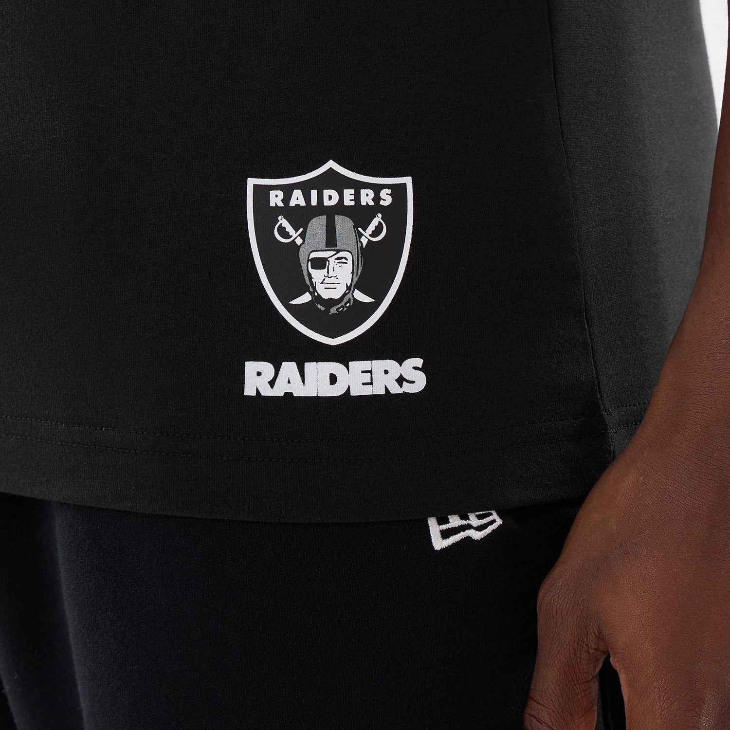 The model is wearing this NFL Training 2026 Las Vegas Raiders T-Shirt in black. 4