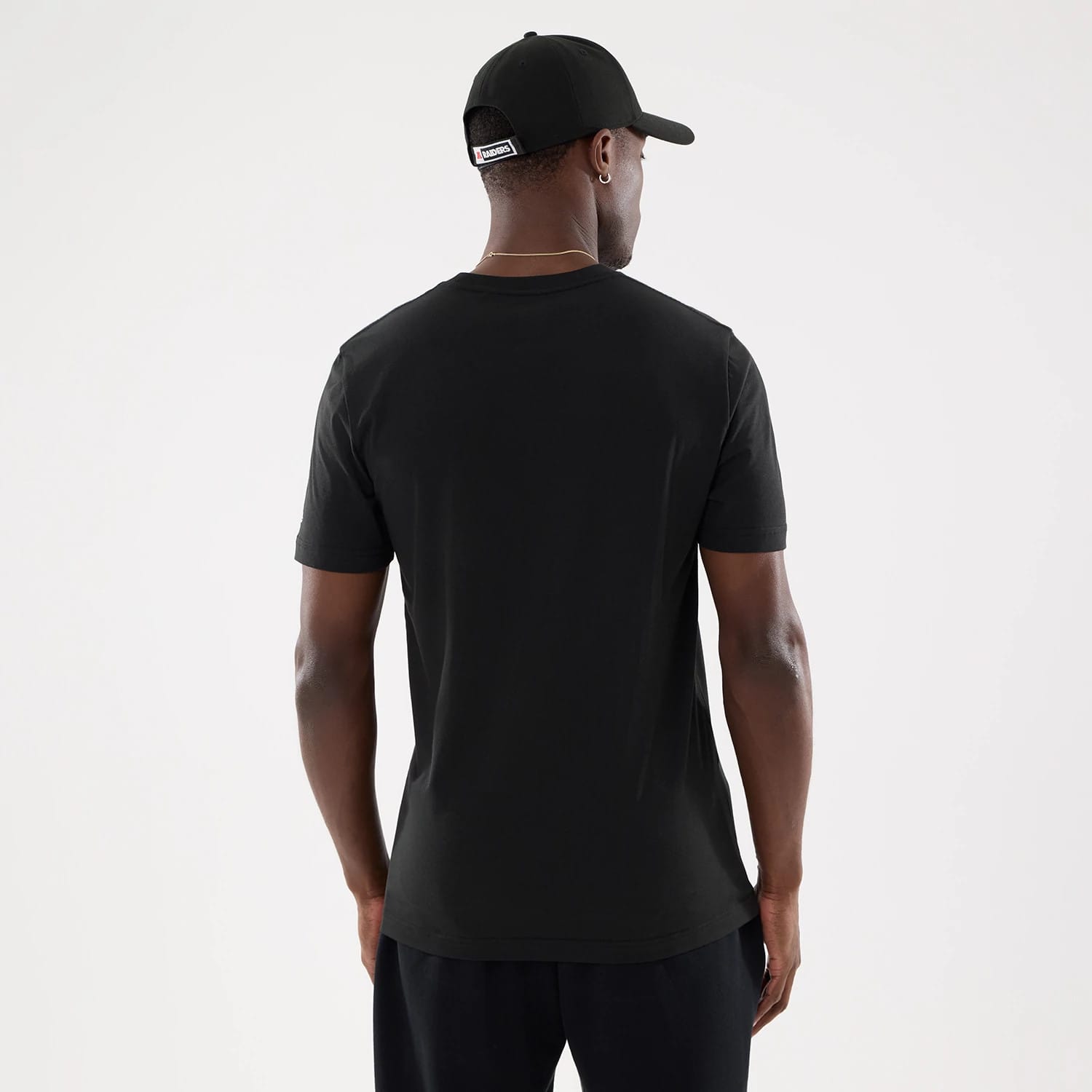 The model is wearing this NFL Training 2026 Las Vegas Raiders T-Shirt in black. 2