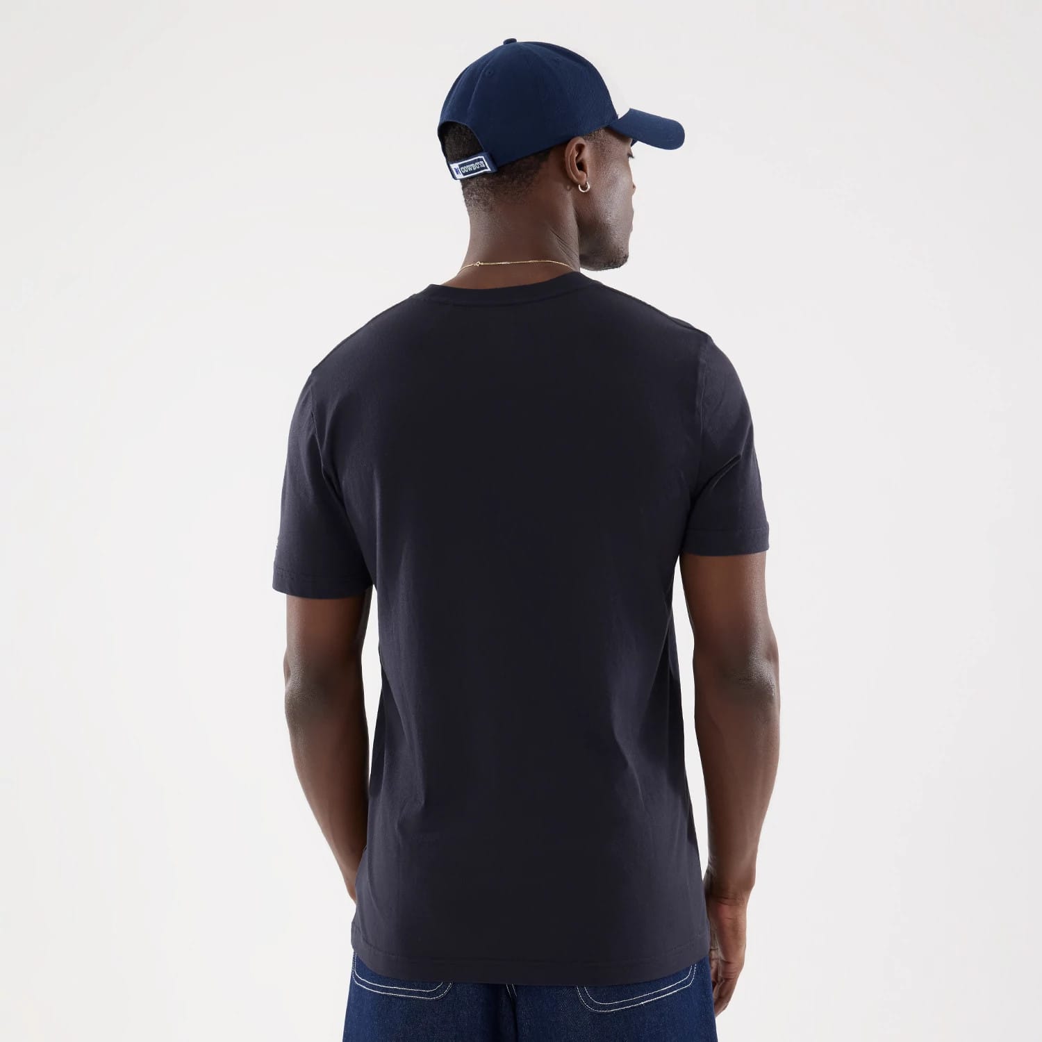 The model is wearing this NFL Training 2026 Dallas Cowboys T-Shirt in navy. 2