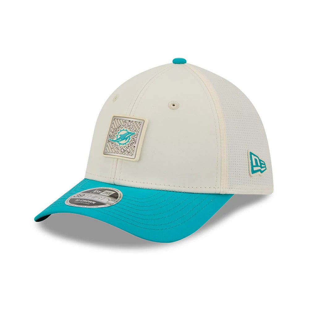 Miami Dolphins NFL Training 2026 White New Era 39THIRTY M-Crown Stretch Fit Cap, three-quarter view showing the embossed square Dolphins logo on the front panel, a turquoise visor with a 39THIRTY size sticker, and New Era flag logo on the left side.