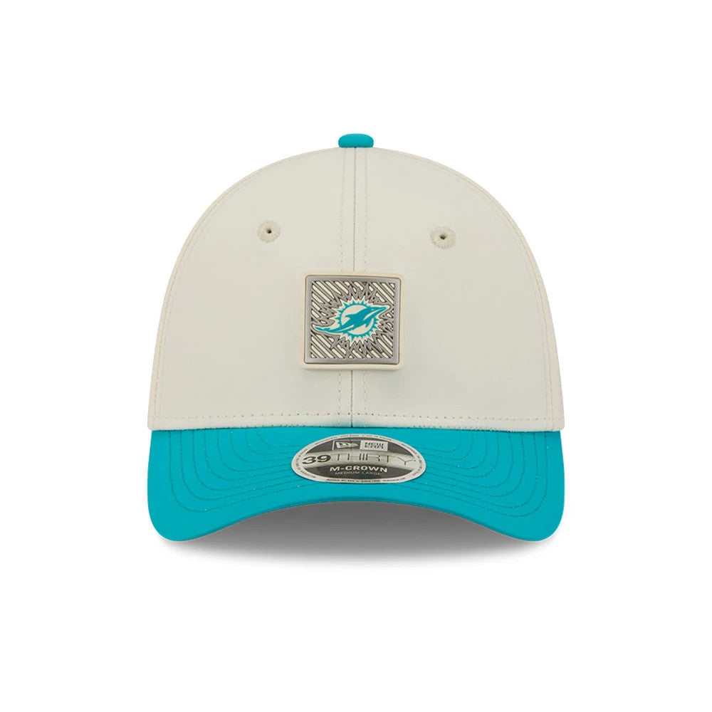 Miami Dolphins NFL Training 2026 White New Era 39THIRTY M-Crown Stretch Fit Cap, front view showing a square patch with the Dolphins logo on the structured white front panel, teal visor and 39THIRTY size sticker underneath.