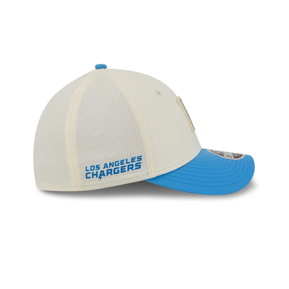 LA Chargers NFL Training 2026 White New Era 39THIRTY M-Crown Stretch Fit Cap, side view showing the blue embroidered Los Angeles Chargers text on the white crown, blue curved visor, and New Era flag logo on the left side.