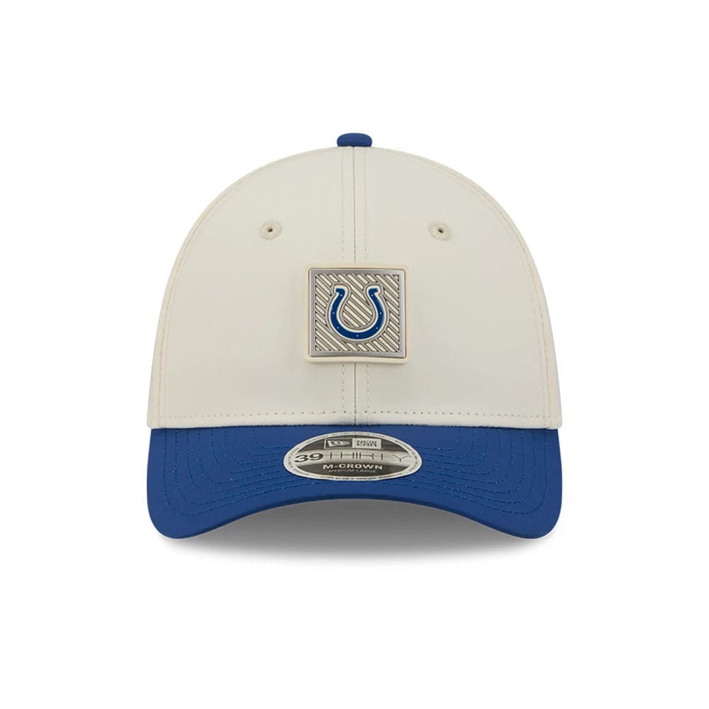 Indianapolis Colts NFL Training 2026 White New Era 39THIRTY M-Crown Stretch Fit Cap, front view showing a raised silver square patch with a blue Colts horseshoe logo on the front panel, blue curved visor, and 39THIRTY size sticker on the top.
