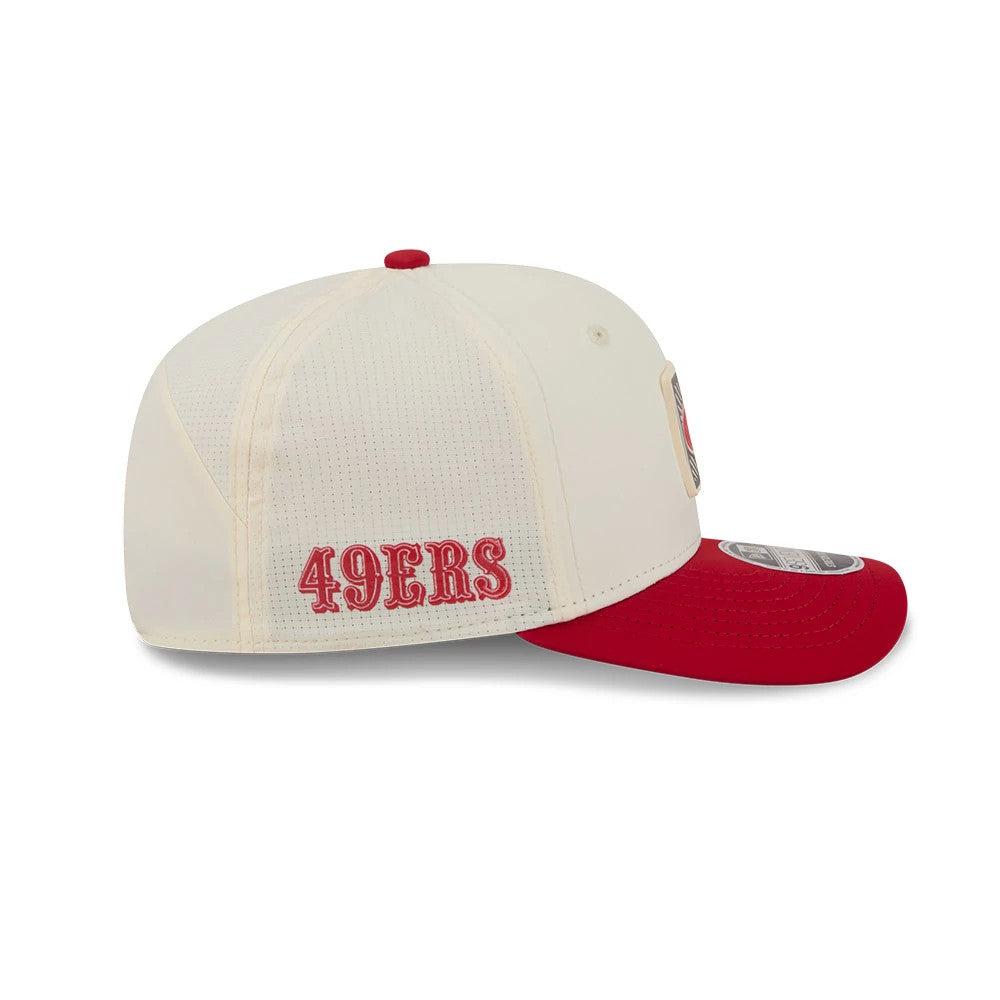 49ers NFL Training 2026 White New Era 9SEVENTY Stretch Snap Adjustable Cap, side view showing red embroidered 49ERS logo on the structured white crown, with red top button and curved red visor featuring a 9SEVENTY size sticker.