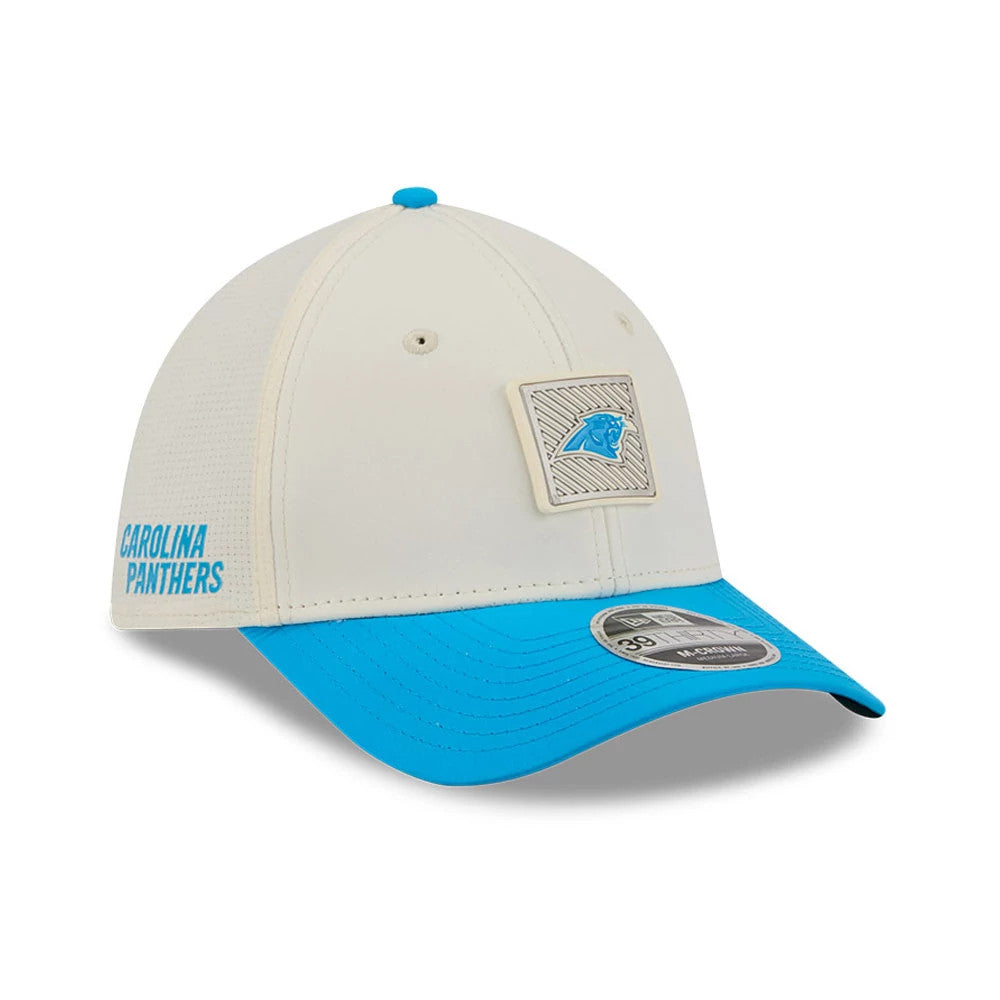 Carolina Panthers NFL Training 2026 White New Era 39THIRTY M-Crown Stretch Fit Cap, three-quarter view showing a raised embroidered team logo on the front panel, a turquoise pre-curved visor with a 39THIRTY size sticker, and side lettering.