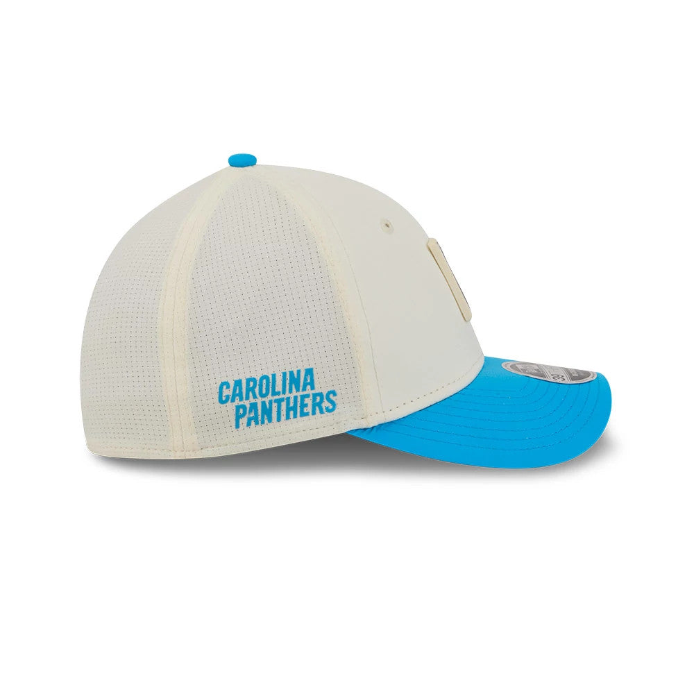 Carolina Panthers NFL Training 2026 White New Era 39THIRTY M-Crown Stretch Fit Cap, side view showing the blue Carolina Panthers wordmark embroidered on the rear panel, a blue top button, and a curved blue visor with a 39THIRTY size sticker.