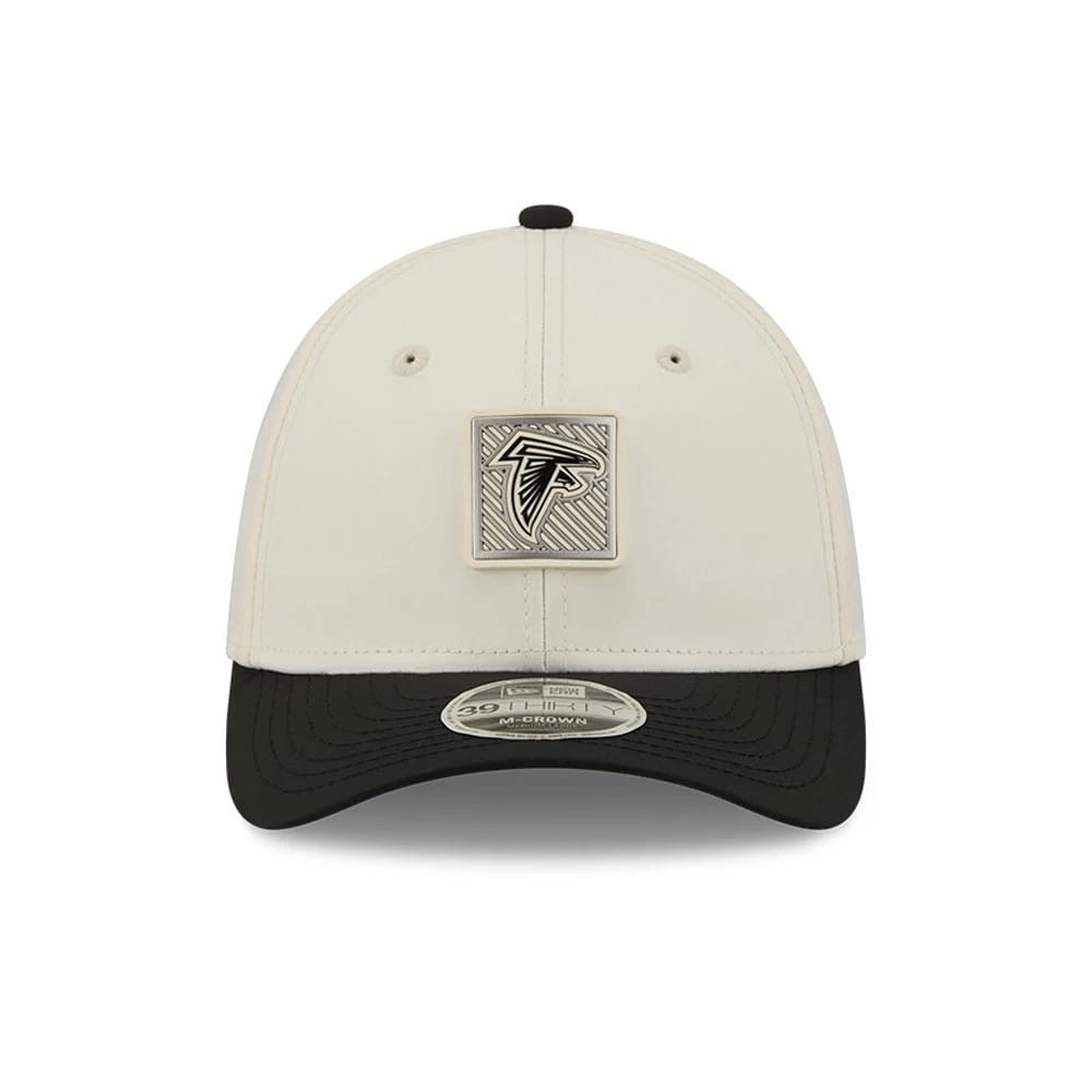 Atlanta Falcons NFL Training 2026 White New Era 39THIRTY M-Crown Stretch Fit Cap, front view showing the square team logo badge on the white structured crown, a black curved visor, and a 39THIRTY size sticker on the visor.