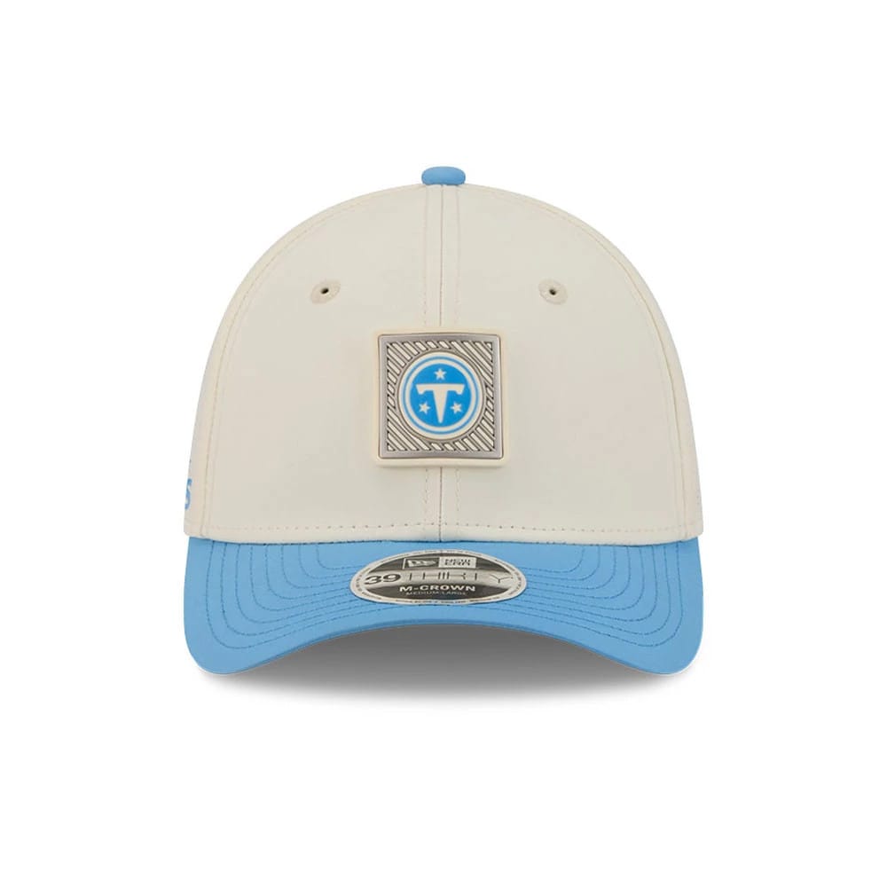 Pictured is this NFL Training 2026 Tennessee Titans 39THIRTY M-Crown Stretch Fit cap in pastel white. 2