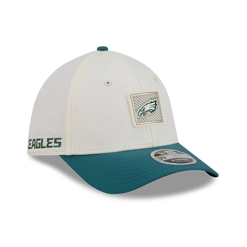 Eagles NFL Training 2026 White New Era 39THIRTY M-Crown Stretch Fit Cap, three-quarter view showing the raised embroidered Eagles logo on the front panel, white mesh crown with eyelets, and a dark teal curved visor with a 39THIRTY size sticker.