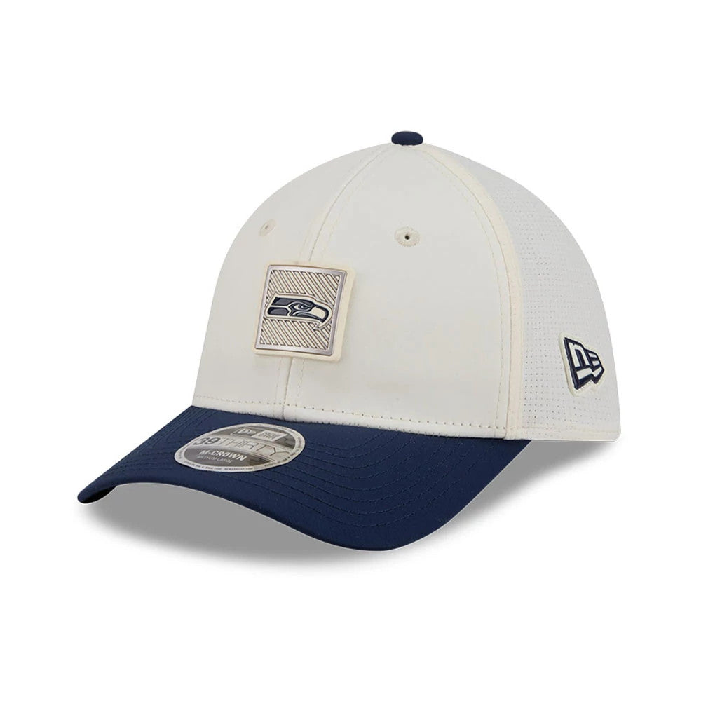 Seattle Seahawks NFL Training 2026 White New Era 39THIRTY M-Crown Stretch Fit Cap, three-quarter view showing the team logo patch on the front panel, a New Era flag logo embroidered on the left side.