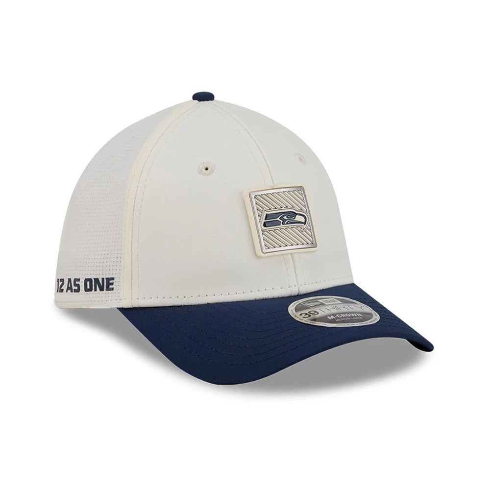 Seattle Seahawks NFL Training 2026 White New Era 39THIRTY M-Crown Stretch Fit Cap, three-quarter view showing the raised embroidered Seahawks logo badge on the front panel, dark navy curved visor with 39THIRTY size sticker.
