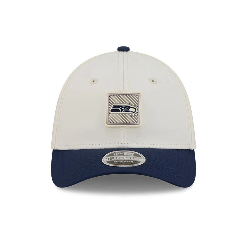 Seattle Seahawks NFL Training 2026 White New Era 39THIRTY M-Crown Stretch Fit Cap, front view showing the raised Seattle Seahawks logo on the structured white crown, navy curved visor, and 39THIRTY size sticker on the centre front.