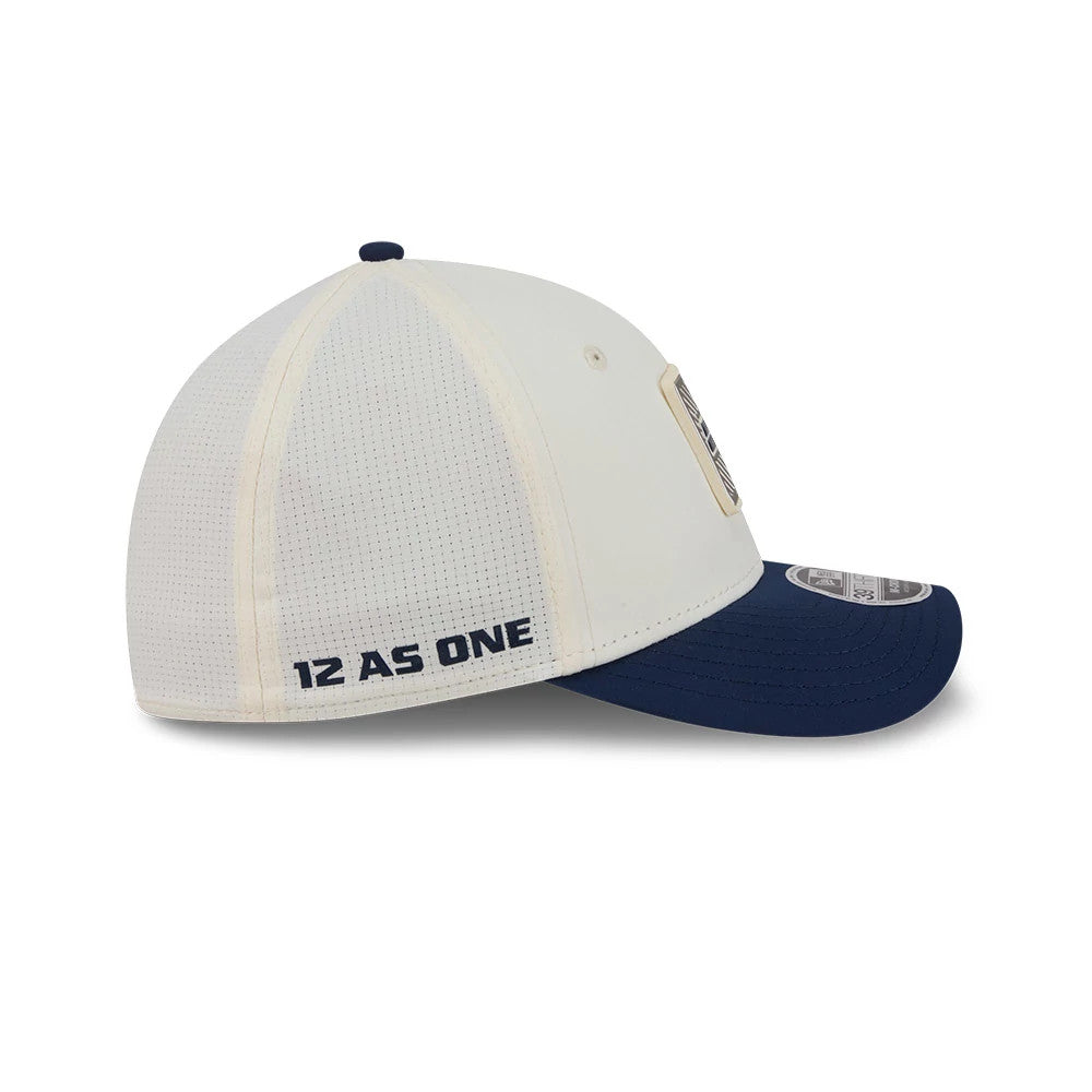 Seattle Seahawks NFL Training 2026 White New Era 39THIRTY M-Crown Stretch Fit Cap, side view showing the 12 as One text embroidered in navy on the back left panel, with a structured white crown and a curved navy visor.