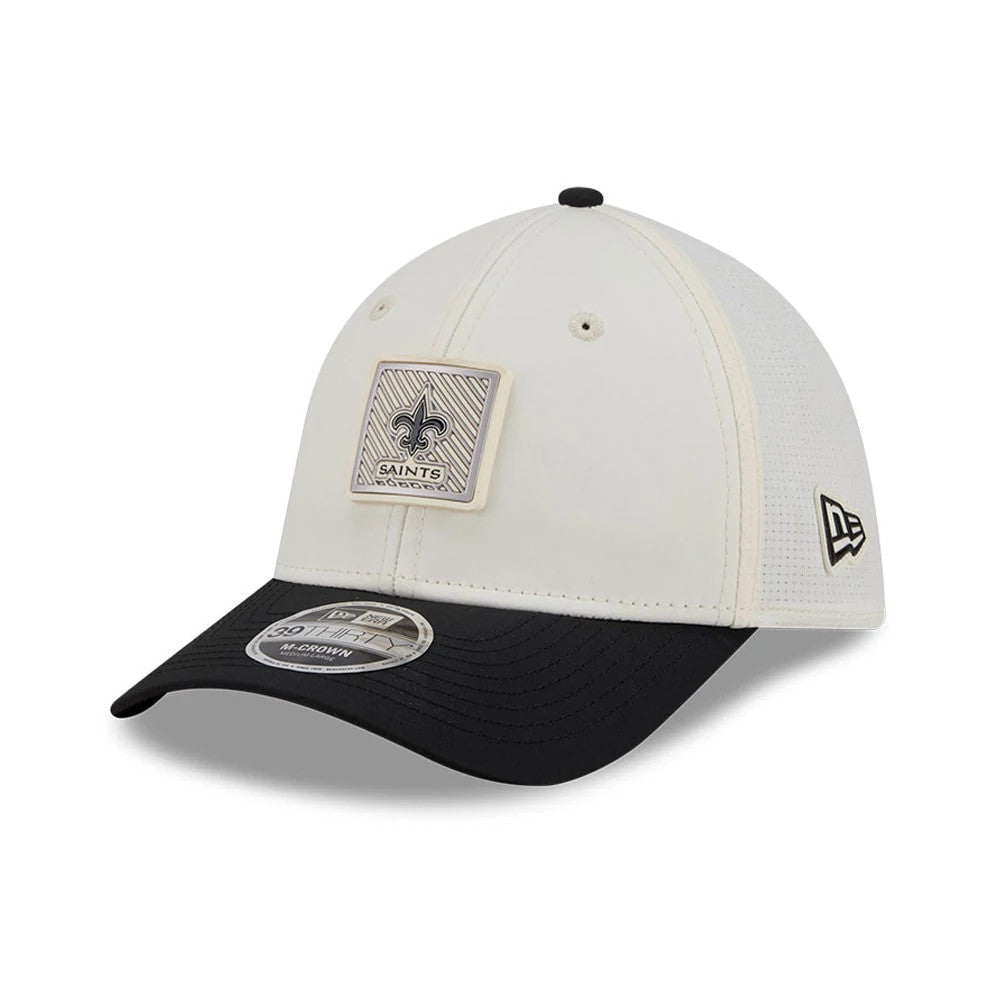 New Orleans Saints NFL Training 2026 White New Era 39THIRTY M-Crown Stretch Fit Cap, front view showing the grey and black Saints logo patch on the front panel, black curved visor with a 39THIRTY size sticker, and New Era flag logo on the left side.