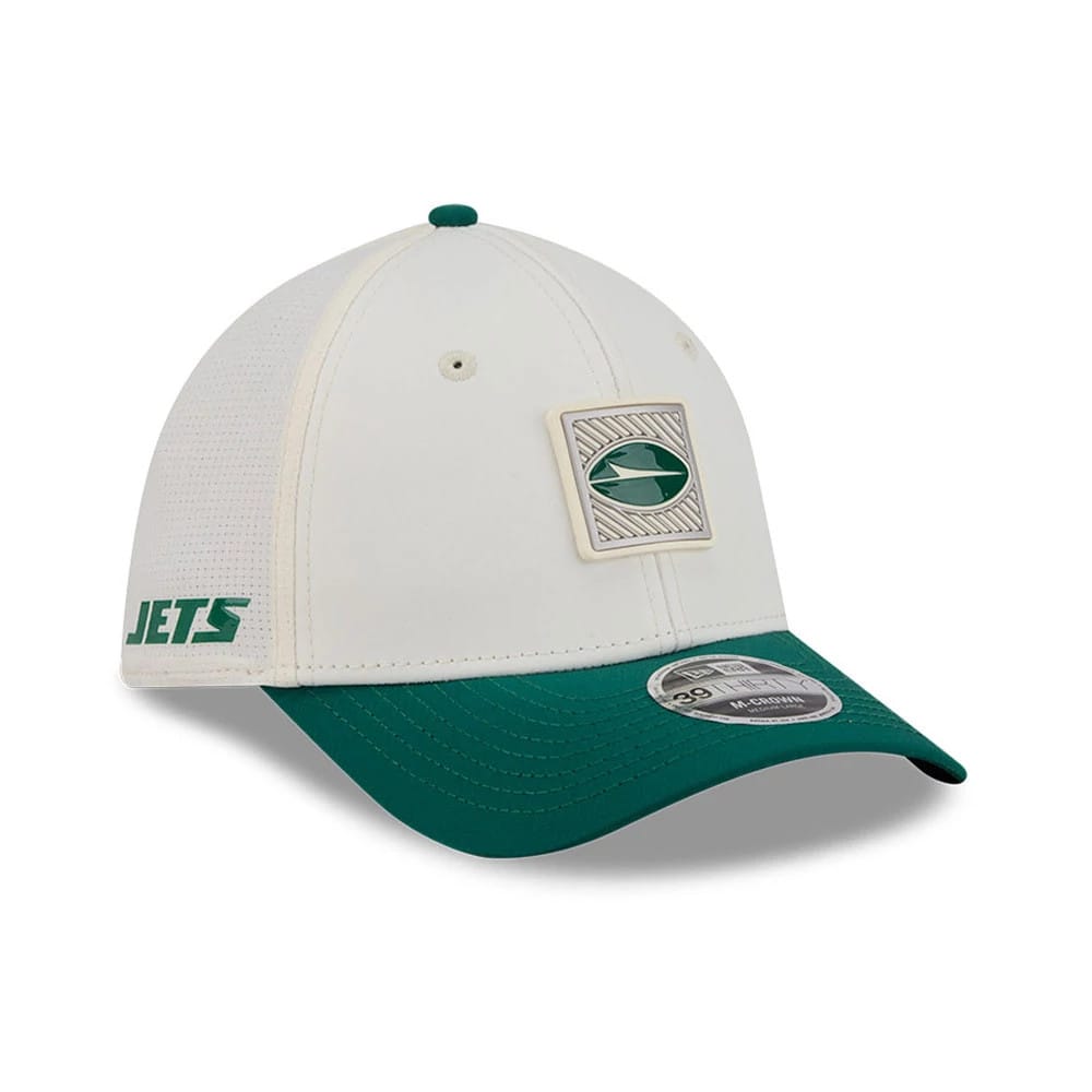 New York Jets NFL Training 2026 White New Era 39THIRTY M-Crown Stretch Fit Cap, three-quarter view showing an embroidered oval logo patch on the front panel, a green curved visor with a 39THIRTY size sticker, and green Jets text on the left side.