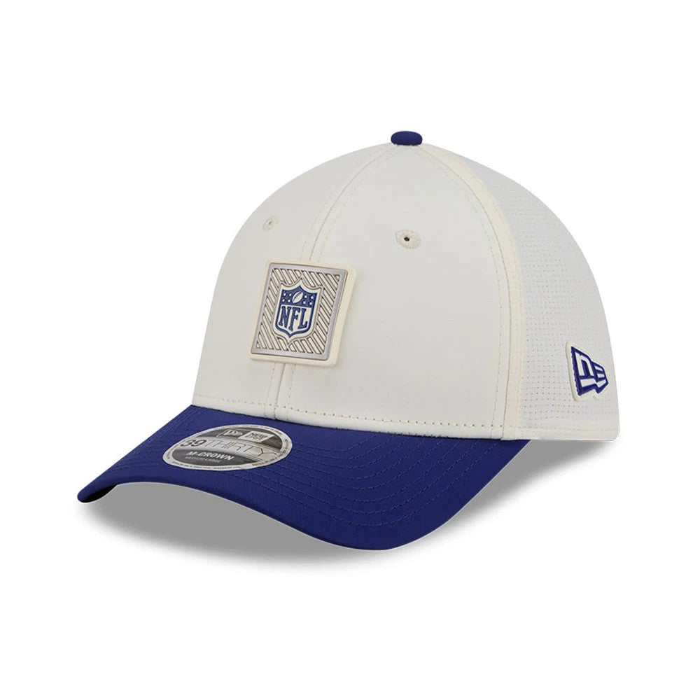Official Logo NFL Training 2026 White New Era 39THIRTY M-Crown Stretch Fit Cap, three-quarter view showing a raised NFL logo patch on the white front panel, contrasting with a royal blue visor and a New Era flag logo on the left side.