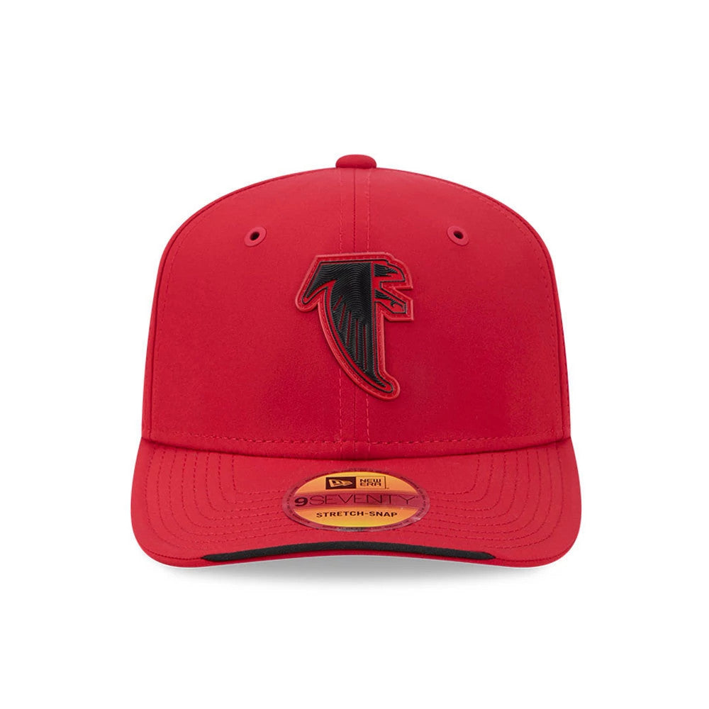 Falcons NFL Sideline 2026 Red New Era 9SEVENTY Stretch Snap Adjustable Cap, front view showing a raised black and red Falcons logo on the front panel, red visor with a 9SEVENTY size sticker, and matching red crown eyelets.