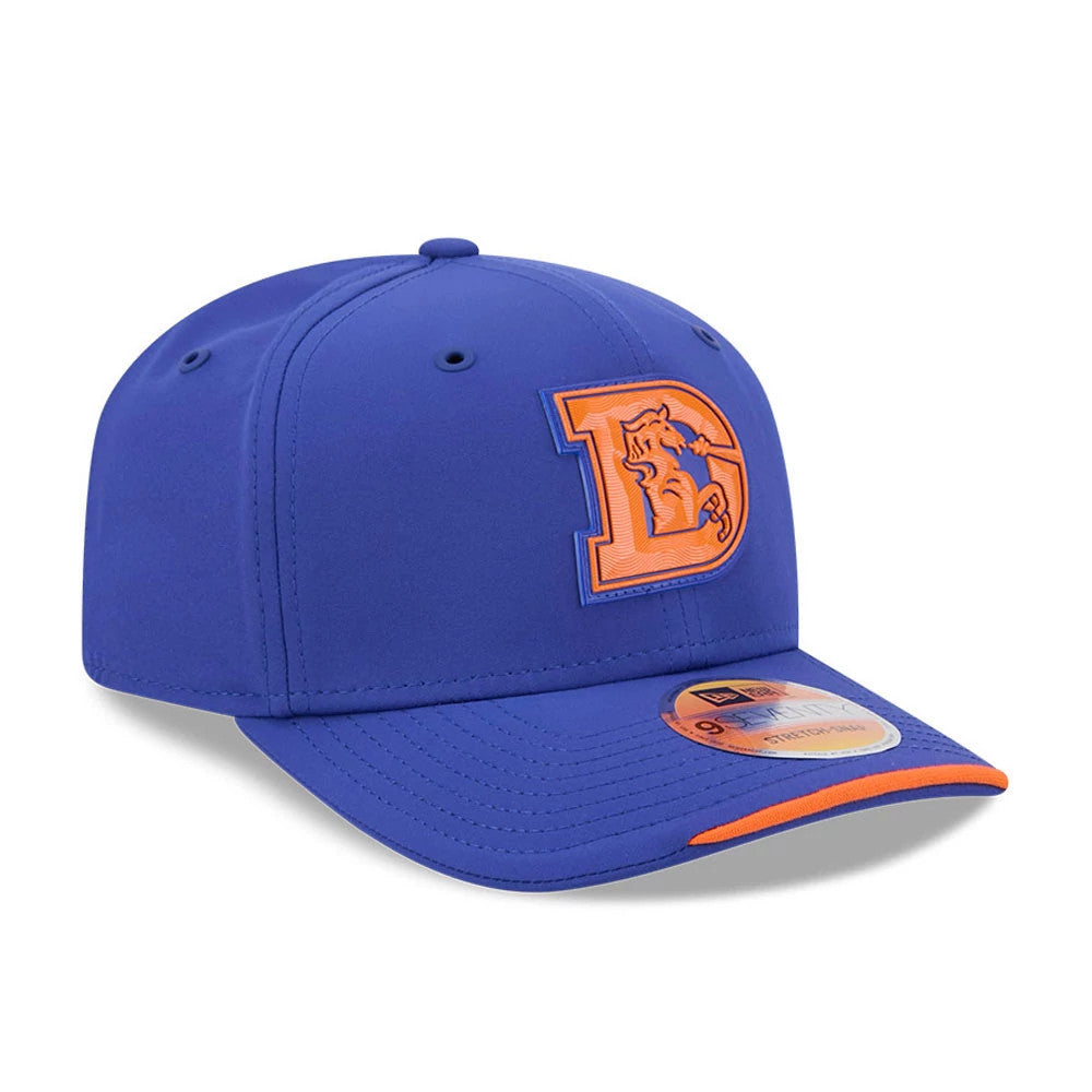 Broncos NFL Sideline 2026 Blue New Era 9SEVENTY Stretch Snap Adjustable Cap, three-quarter view showing the orange embroidered Denver Broncos throwback logo on the front panel, curved blue visor with orange underside.