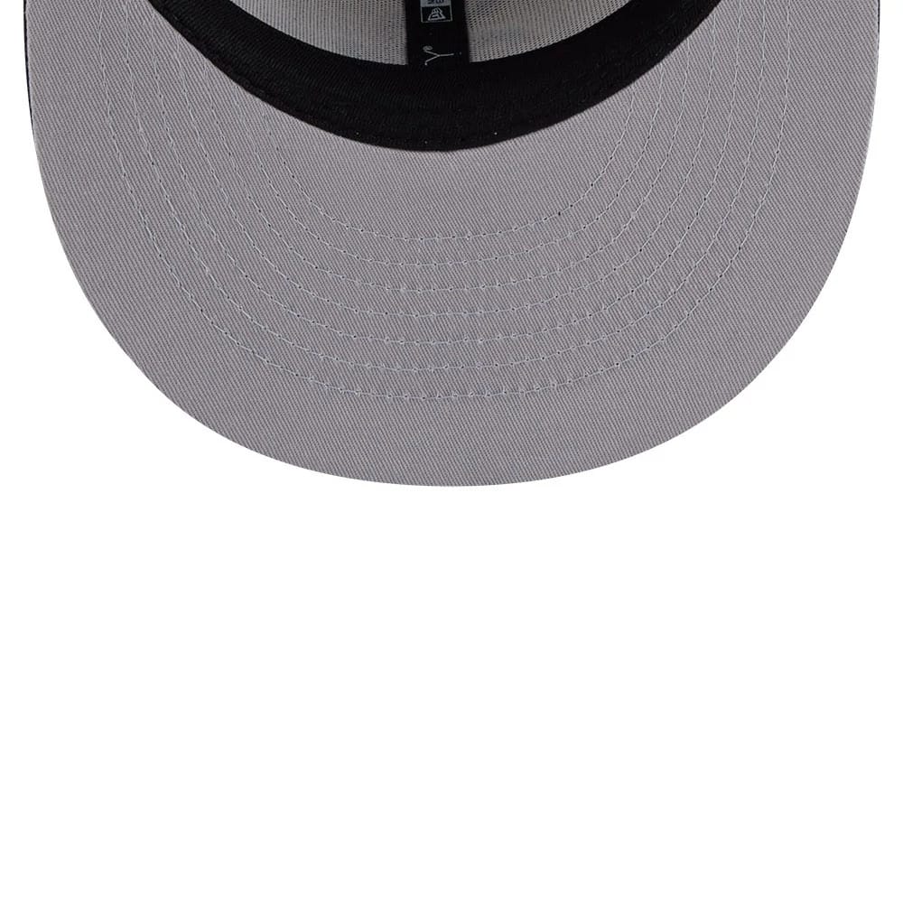Chicago White Sox MLB Heritage Light Beige New Era 59FIFTY Fitted Cap, inside view showing a light beige undervisor with white stitching, a black sweatband with the New Era logo, and black taping running along the interior seams.