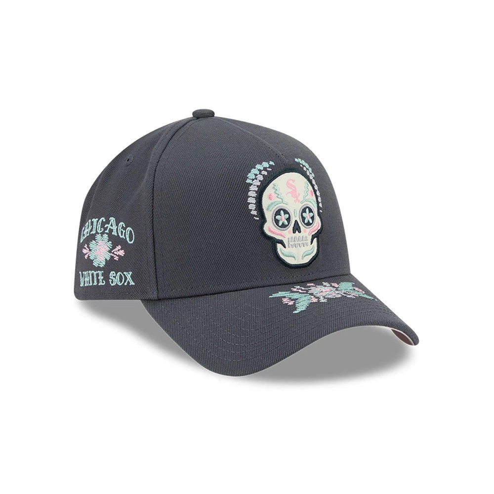 Chicago White Sox MLB Day Of The Dead Grey New Era 9FORTY A-Frame Adjustable Cap, front view showing an intricately embroidered skull design with pastel accents on the structured grey crown, pink floral details on the visor, and side team branding.