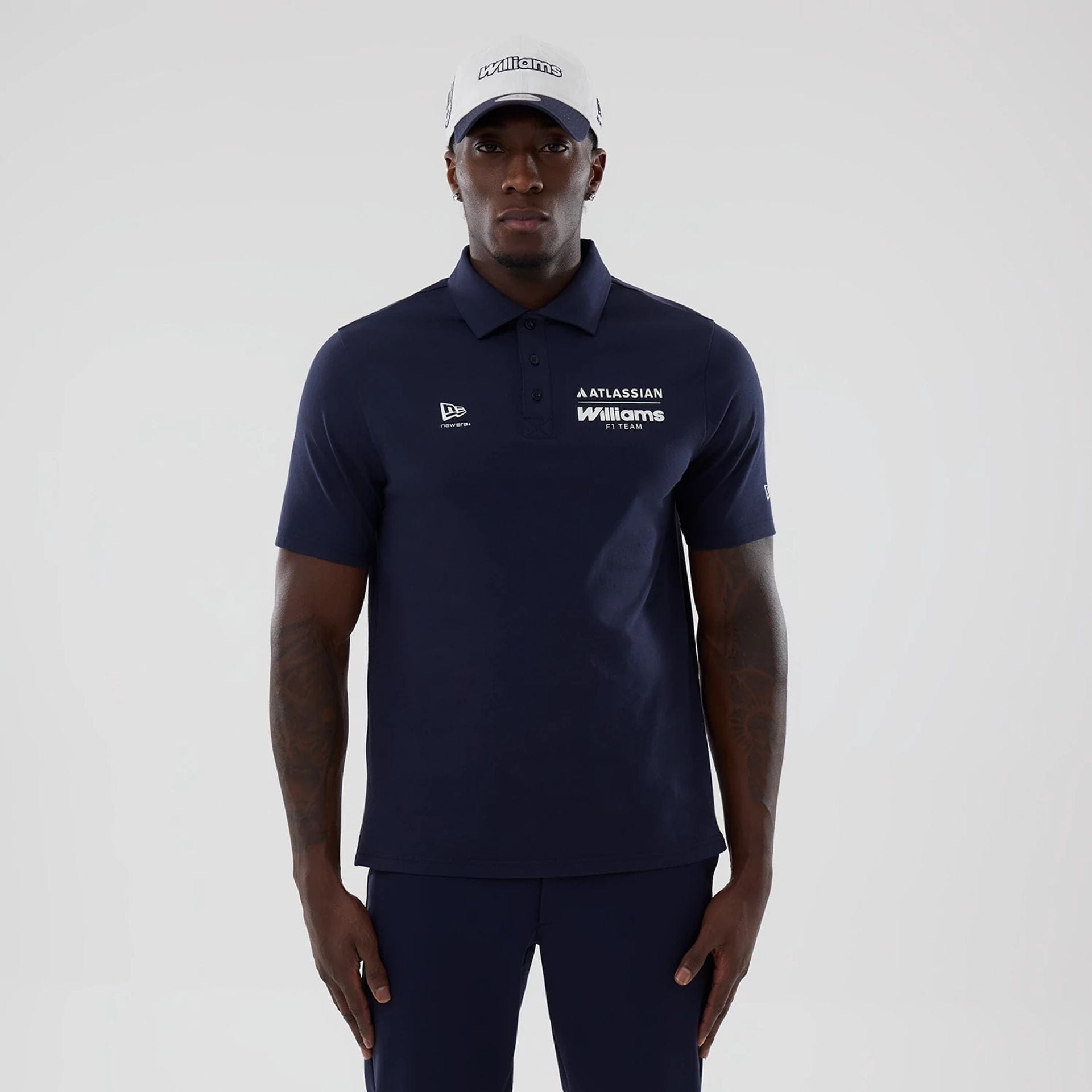 The model is wearing this Atlassian Williams F1 Team Polo T-Shirt in navy. 1