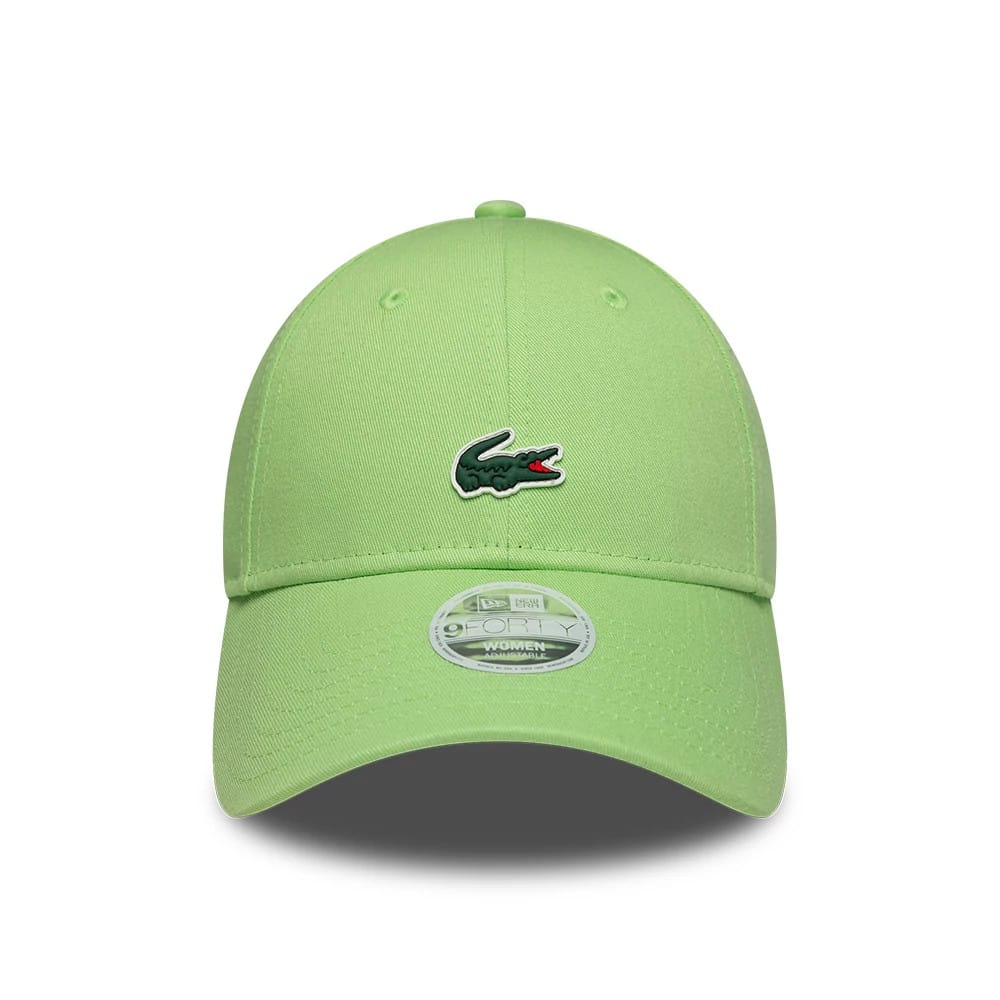 Womens Lacoste X New Era Pastel Green 9FORTY Adjustable Cap, front view showing the Lacoste crocodile logo embroidered on the structured pastel green crown, with a curved visor and 9FORTY size sticker centrally placed on the visor.