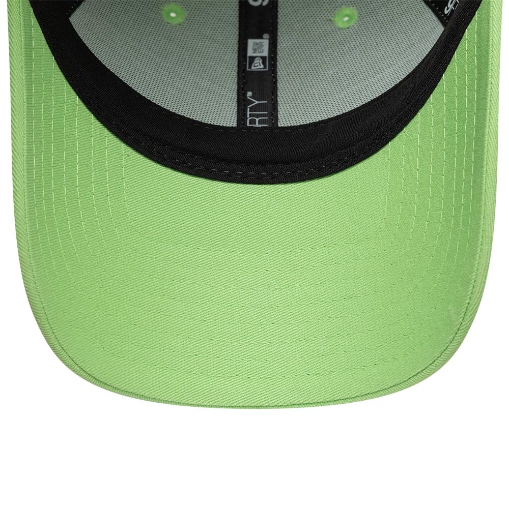 Womens Lacoste X New Era Pastel Green 9FORTY Adjustable Cap, inside view showing the black taping along the centre, a pastel green undervisor matching the cap colour, and four evenly spaced embroidered eyelets in the crown.