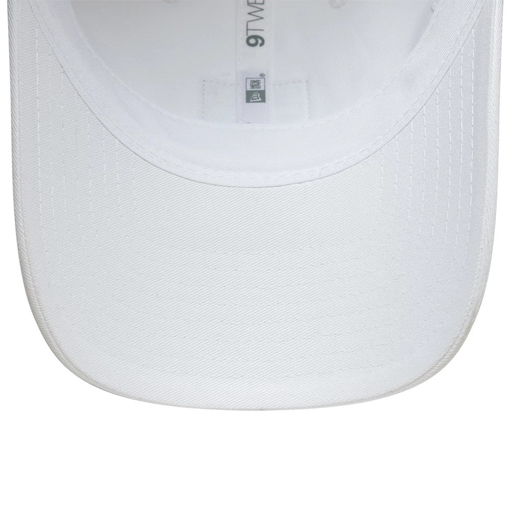 Lacoste X New Era Golf White New Era 9TWENTY Adjustable Cap, inside view showing white taping along the seams with the New Era flag logo, a white sweatband, and the white fabric undervisor.