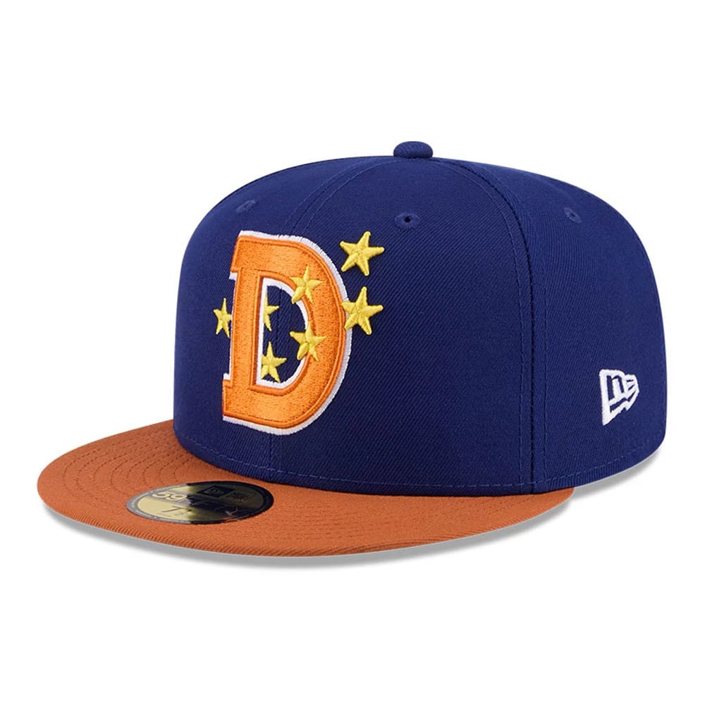 Durham Bulls MiLB Theme Night Navy New Era 59FIFTY Fitted Cap, three-quarter view showing a large orange embroidered D with yellow stars on the front panel, an orange visor, and the white New Era flag logo on the left side.