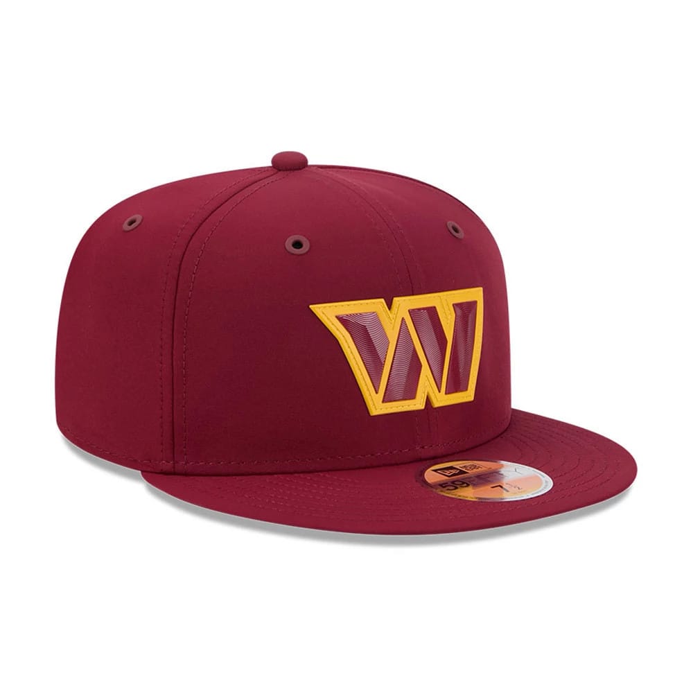 Washington Commanders NFL Sideline 2026 Dark Red New Era 59FIFTY Fitted Cap, three-quarter view showing the large yellow and white embroidered W logo on the front panel, paired with a flat dark red visor featuring a gold 59FIFTY size sticker.