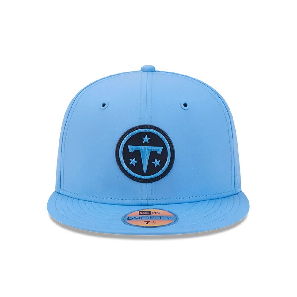 Tennessee Titans NFL Sideline 2026 Pastel Blue New Era 59FIFTY Fitted Cap, front view showing a raised black and blue embroidered team logo on the front panel, with ventilated eyelets and a gold 59FIFTY size sticker on the flat pastel blue visor.