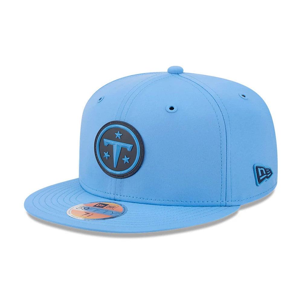 Tennessee Titans NFL Sideline 2026 Pastel Blue New Era 59FIFTY Fitted Cap, front view showing a blue and black raised embroidered Titans logo on the front panel, pastel blue visor with a gold 59FIFTY size sticker.
