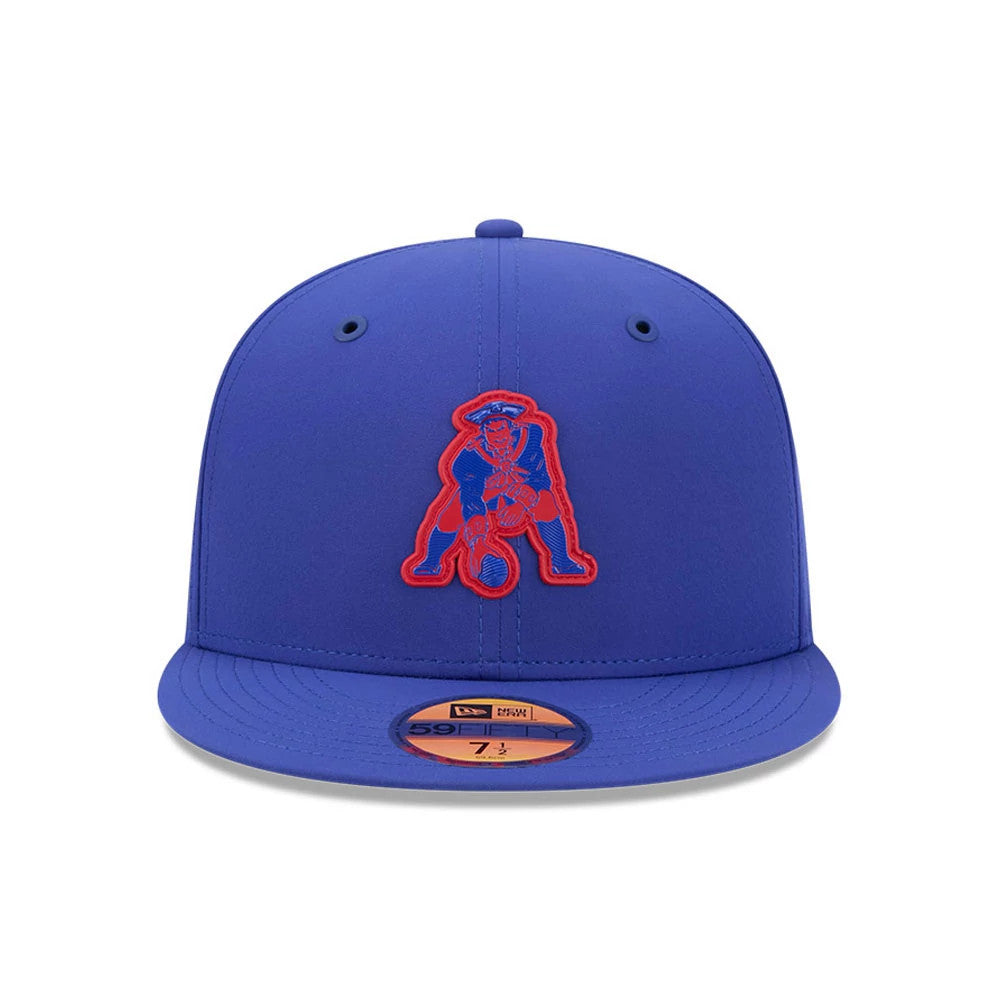 New England Patriots NFL Sideline 2026 Blue New Era 59FIFTY Fitted Cap, front view showing a red embroidered Patriots mascot logo on the front panel, a flat blue visor, and a gold 59FIFTY size sticker on the visor.