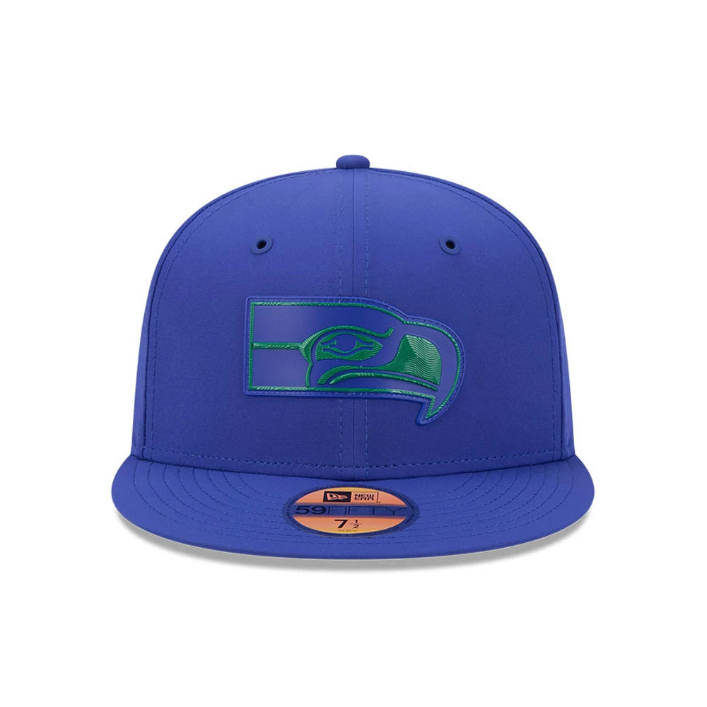 Seattle Seahawks NFL Sideline 2026 Blue New Era 59FIFTY Fitted Cap, front view showing the raised embroidered green Seahawks logo on the structured blue crown, with a matching blue visor and the gold 59FIFTY size sticker on the visor.