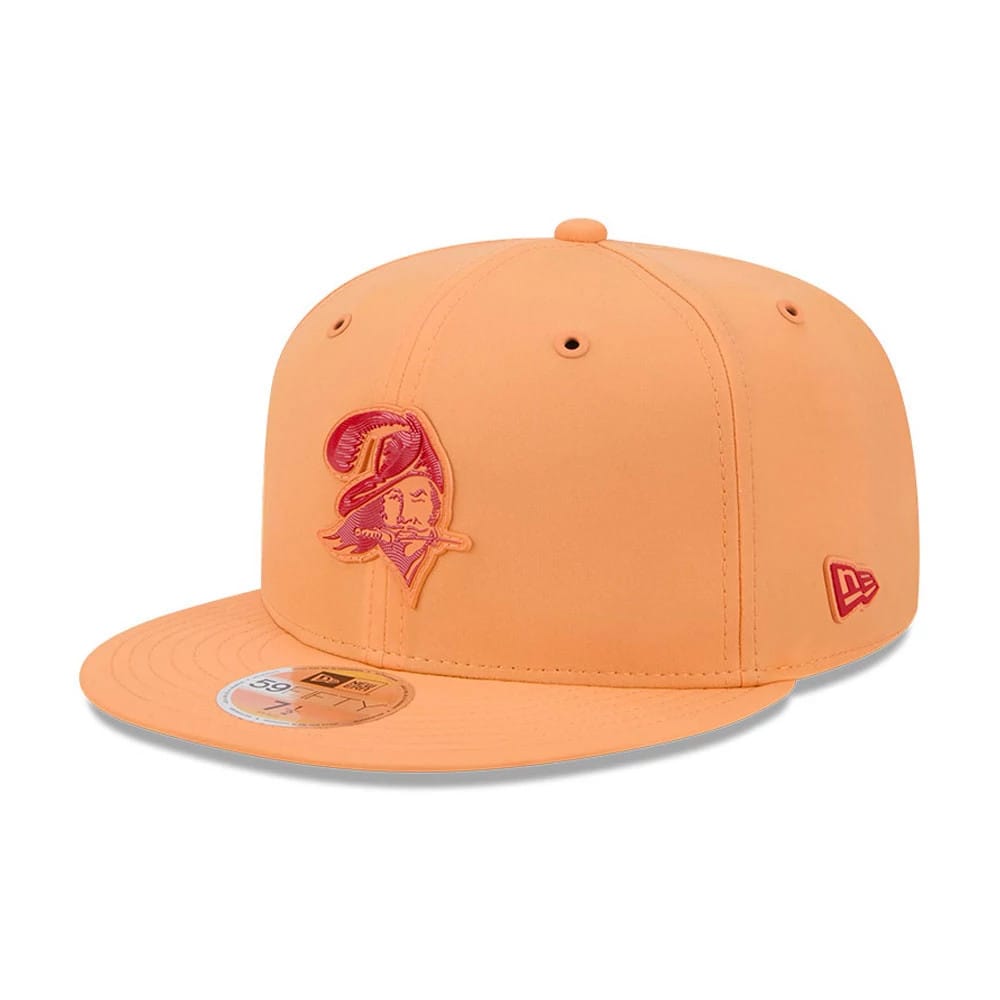 Tampa Bay Buccaneers NFL Sideline 2026 Orange New Era 59FIFTY Fitted Cap, three-quarter view showing the raised orange Buccaneers logo embroidered on the front panel, with an orange visor and a gold 59FIFTY size sticker on the visor's top.