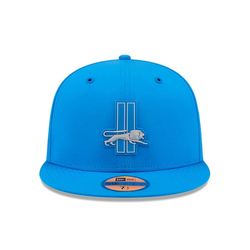 Detroit Lions NFL Sideline 2026 Blue New Era 59FIFTY Fitted Cap, front view showing a grey and blue embroidered lion logo on the structured blue crown, with a flat visor and gold 59FIFTY size sticker centred on the visor.