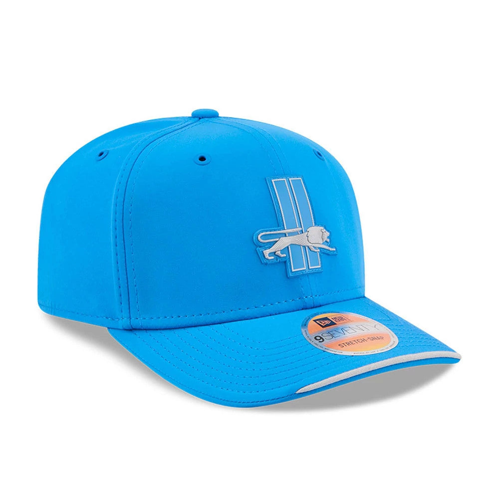 Detroit Lions NFL Sideline 2026 Blue New Era 9SEVENTY Stretch Snap Adjustable Cap, three-quarter view showing the raised light blue logo on the front panel, with blue structured crown, curved visor and 9SEVENTY size sticker on the visor.