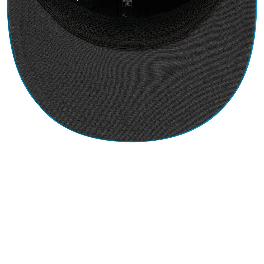 Carolina Panthers NFL Sideline 2026 Blue New Era 59FIFTY Fitted Cap, inside view showing the black sweatband, interior taping with a blue accent, and grey undervisor of the structured flat-visor design.