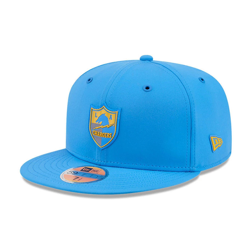 LA Chargers NFL Sideline 2026 Blue New Era 59FIFTY Fitted Cap, three-quarter view showing the raised Chargers crest logo in blue and gold on the front panel, complemented by a blue visor with a size sticker and New Era flag logo on the left side.