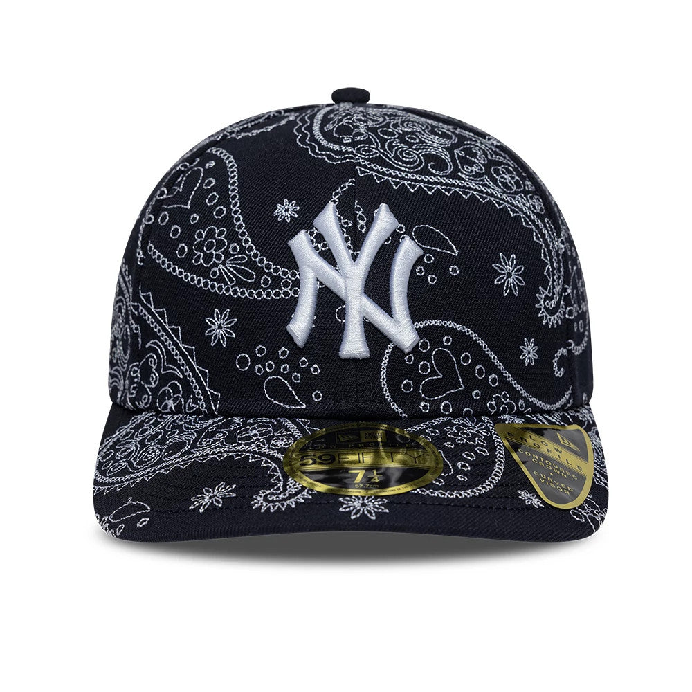 New York Yankees MLB All Over Paisley Navy Low Profile New Era 59FIFTY Fitted Cap, front view showing the white raised embroidered NY logo on the front panel, intricate white paisley pattern across the navy crown and visor.
