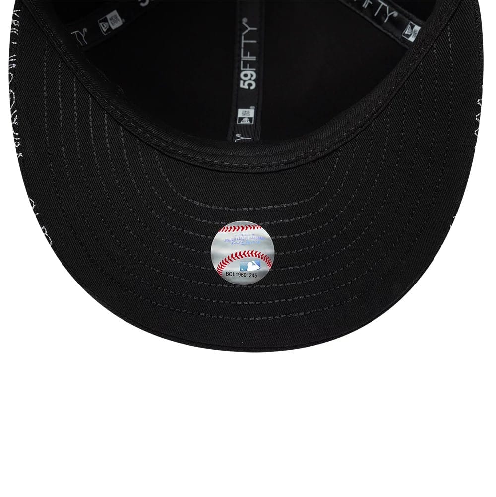Pictured is this MLB All Over Paisley Chicago White Sox Low Profile 59FIFTY Fitted cap in black. 7
