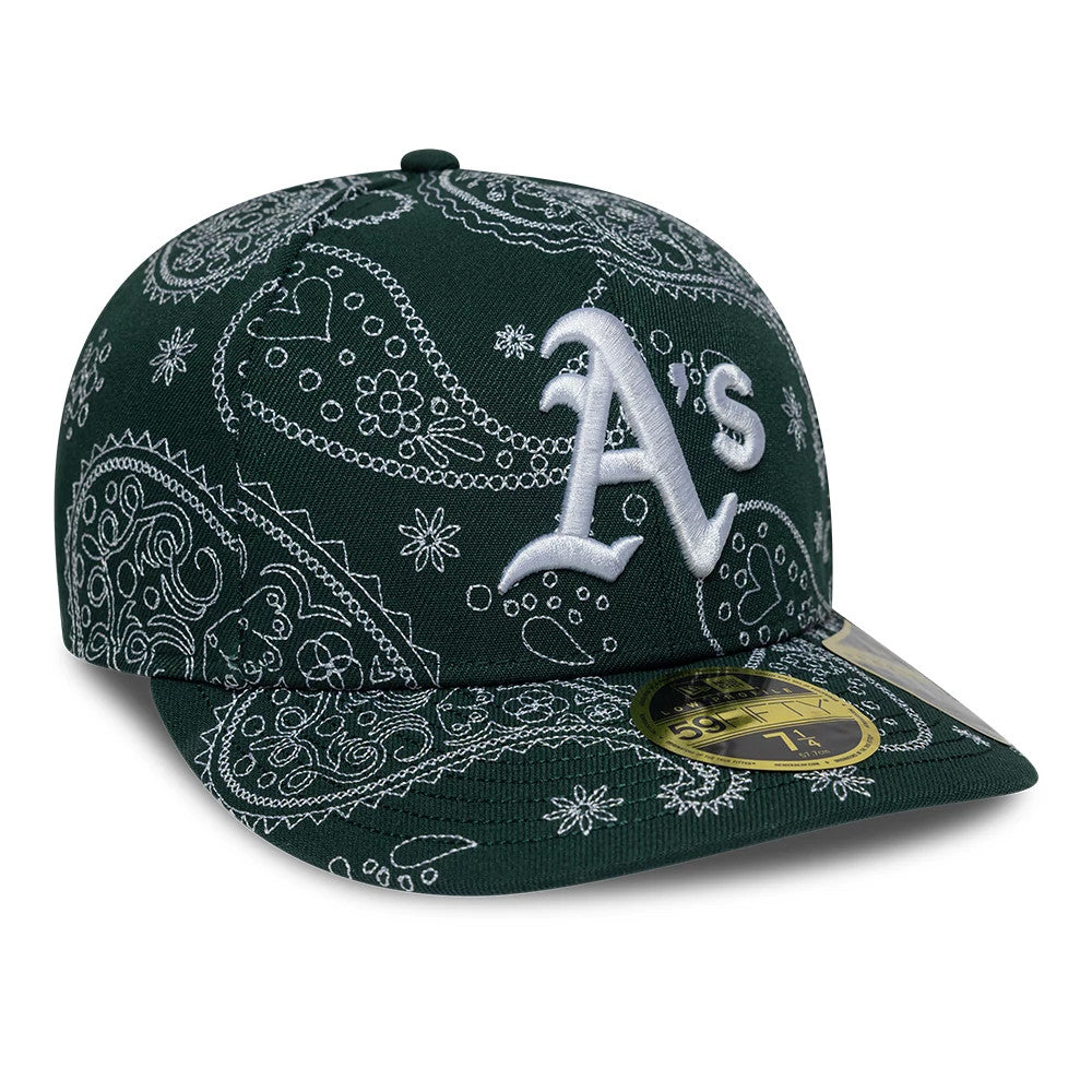 Athletics MLB All Over Paisley Dark Green New Era Low Profile 59FIFTY Fitted Cap, front view showing a raised white A's logo in embroidery on the structured paisley-patterned dark green crown with a flat visor and gold 59FIFTY size sticker.