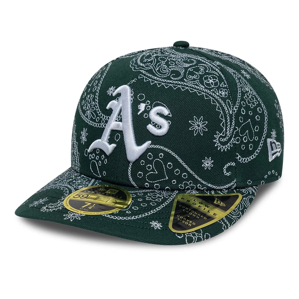 Athletics MLB All Over Paisley Dark Green Low Profile New Era 59FIFTY Fitted Cap, front view showing the raised white embroidered A's logo on the dark green paisley-patterned crown, with a gold 59FIFTY size sticker on the matching paisley visor.