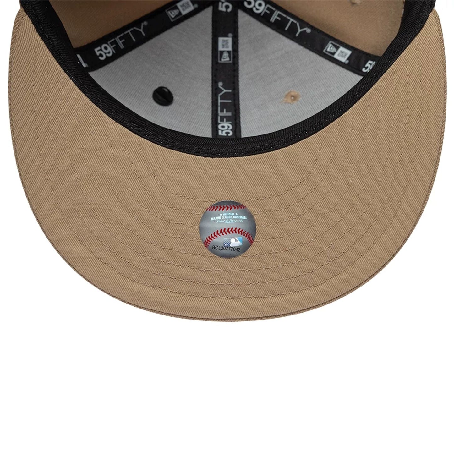 LA Dodgers MLB Food Beige New Era 59FIFTY Fitted Cap, inside view showing black 59FIFTY taping on the grey inner crown, a tan undervisor with an MLB baseball hologram sticker, and a black sweatband around the edge.