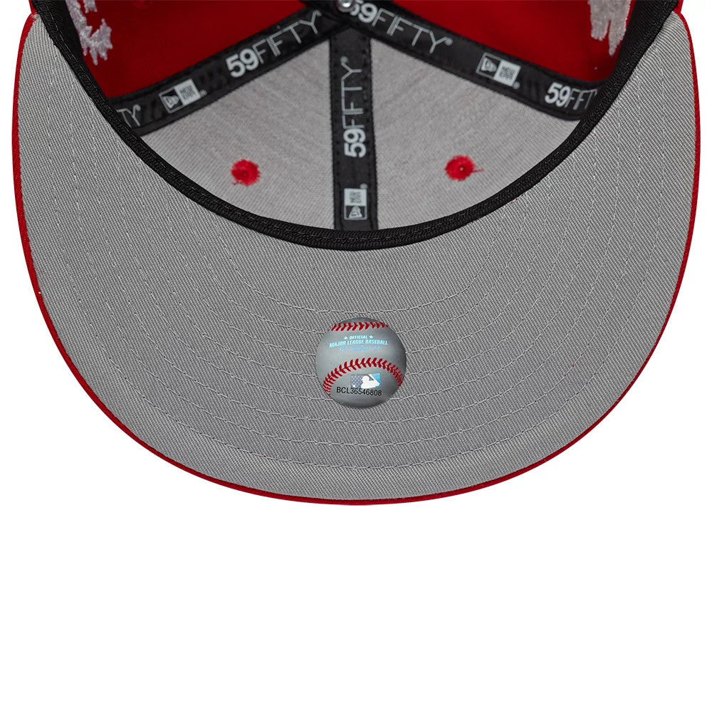 LA Angels MLB Mythical Red New Era 59FIFTY Fitted Cap, inside view showing black and grey taping with 59FIFTY branding, a grey undervisor with a red MLB holographic sticker at the centre, and red eyelets on the crown.